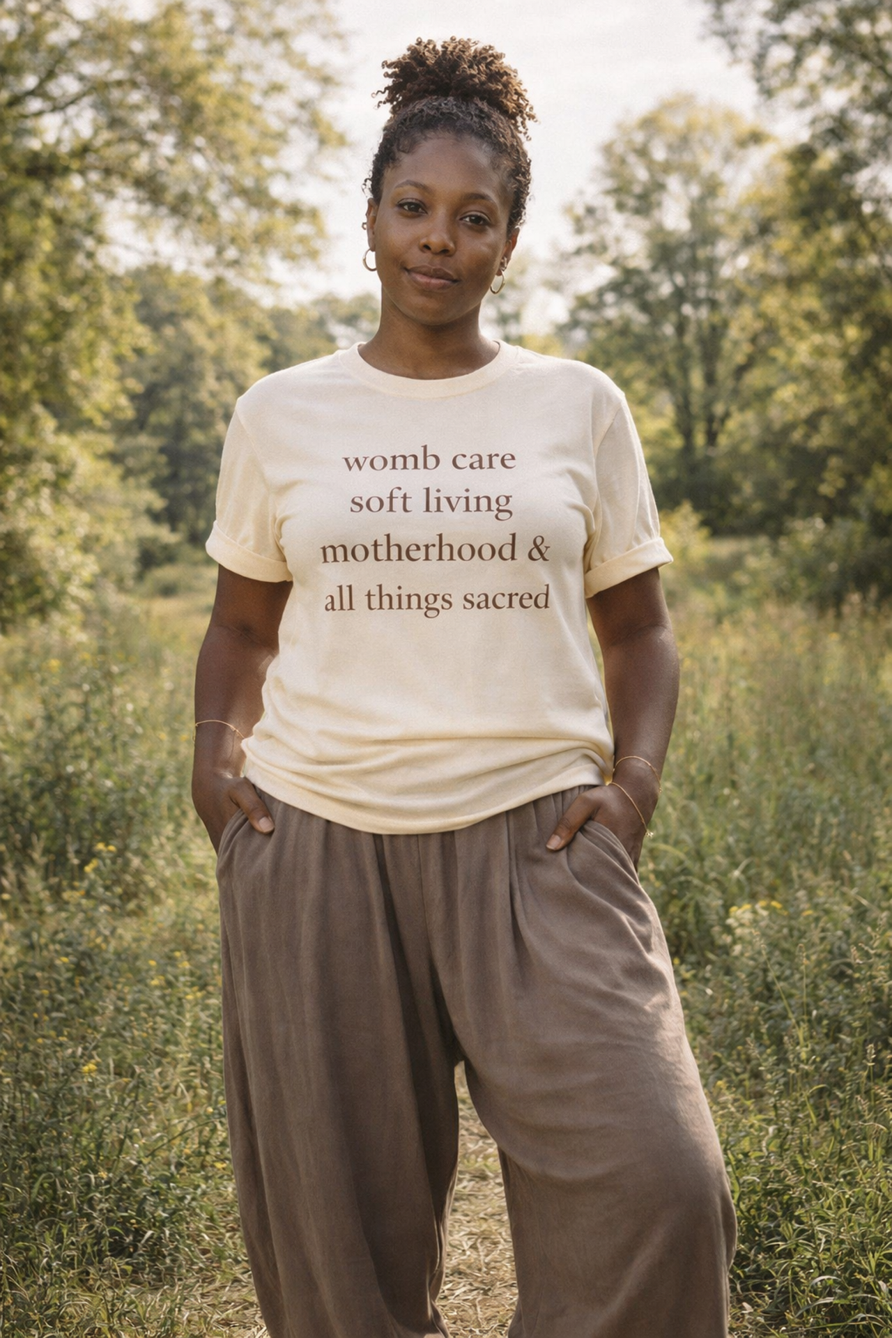 Motherhood Affirmation T-Shirt — “womb care soft living motherhood & all things sacred”