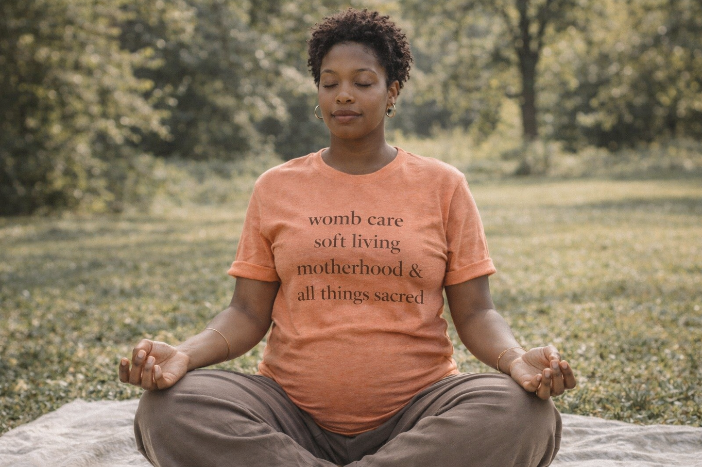 Motherhood Affirmation T-Shirt — “womb care soft living motherhood & all things sacred”