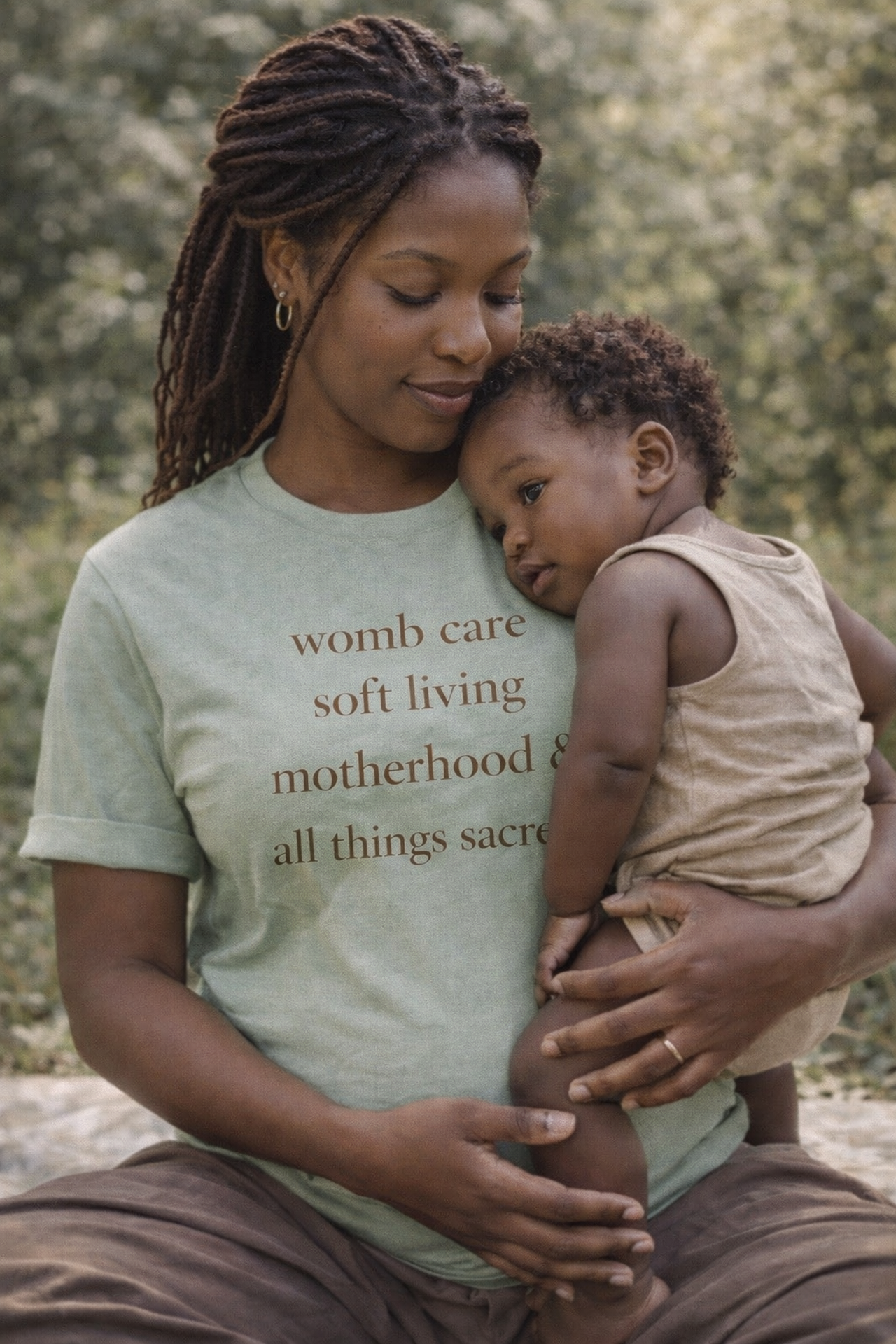Motherhood Affirmation T-Shirt — “womb care soft living motherhood & all things sacred”